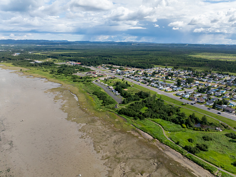 Aerial view of Sept-iles, Cote-Nord, Quebec, Canada. View of the city and the St. Lawrence river during summer.