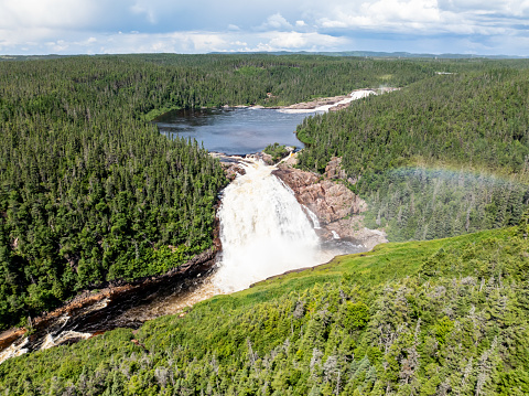 Aerial View of Chute Du Manitou, Cote Nord, Quebec, Canada During Summer.
Located 35 km (22 mi.) from Rivière-au-Tonnerre. Manitou Waterfall is a spectacular 35 m (115-ft.) high.
