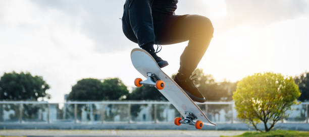 istock Skateboarder skateboarding in modern city 2149655221
