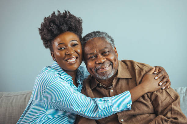 istock Loving father and daughter together on sofa. 2149655396