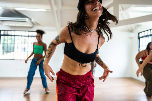 istock Mid adult woman dancing on dance studio 2149655520