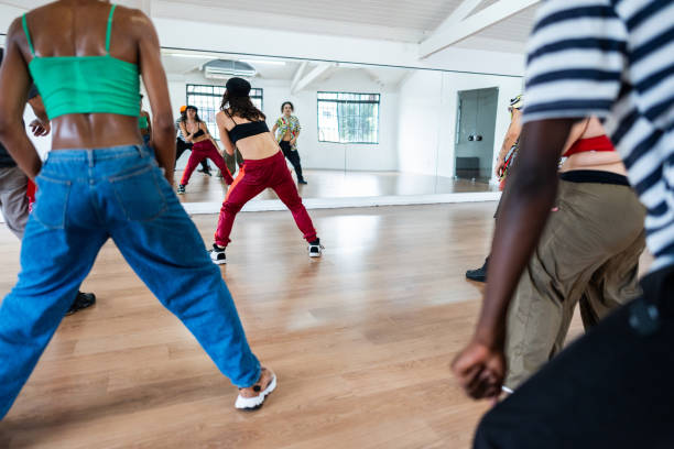 istock Rear view of dancers dancing on dance studio 2149655842