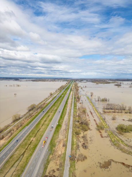 istock Flooded Fields and road in springtime after heavy rain 2149656189