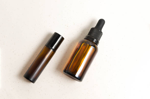 istock Blank amber glass essential oil (serum) bottle with pipette. 2149656692