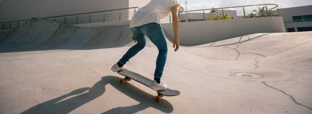 istock Skateboarder skateboarding outdoors in city 2149656973