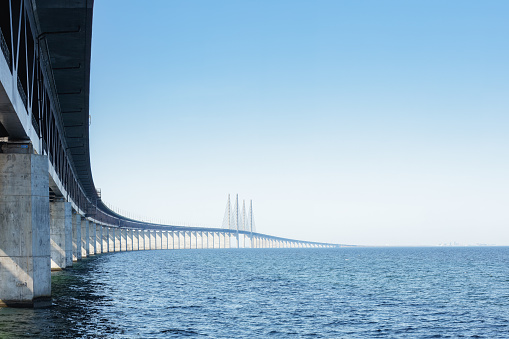 The Oresund Bridge over the Batlic sea, linking Malmo to Copenhagen , view from Sweden. Concepts: connection, travel, transportation
