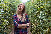 Cropped shot of an attractive young woman working on her self owned farm