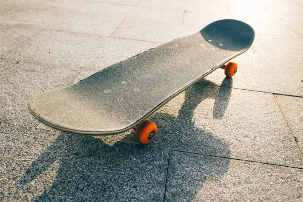 istock Skateboard outdoors in sunrise city 2149658358