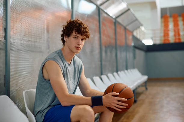 istock Young basketball player on training court looking at camera. 2149659631