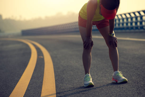 istock Fitness woman runner running on seaside bridge 2149662191