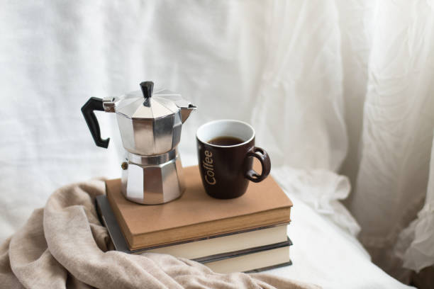 istock Good books and coffee, ideal for spending time indoors. 2149662370