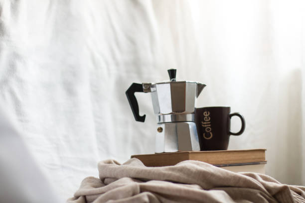 istock Good books and coffee, ideal for spending time indoors. 2149662371