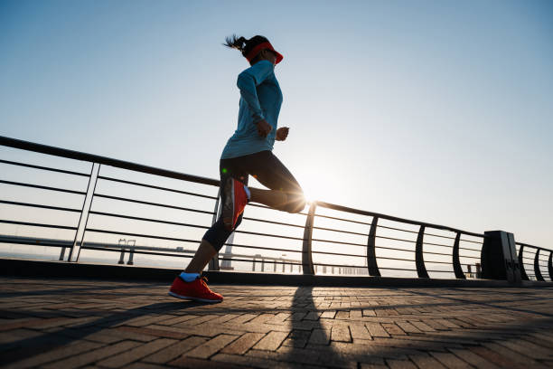 istock Fitness woman runner running at seaside 2149662921