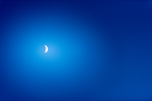Moon Above a Blue Sky at the Dusk