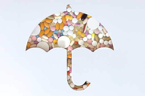 Umbrella shape with pills.