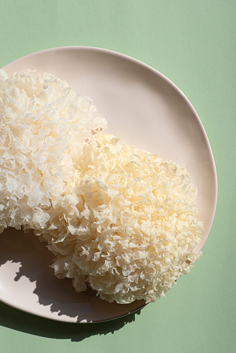 Tremella mushrooms (Tremella fuciformis) or  white fungus or snow ear or coral fungo, are edible mushrooms  have a   anti-inflammatory and antioxidant properties.  Ingredient for salads, soups and biological additive in Asia, Korea, China, Russia
