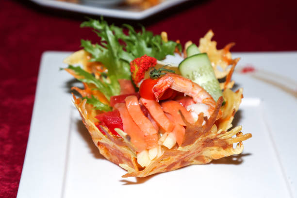 Seafood and vegetable salad, original interesting presentation the dish.