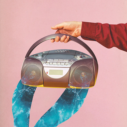 Contemporary art. collage. Hand holding radio with waves flowing from it on pink background. Music and its ability to evoke emotions. Concept of party, Friday mood, rest, music, hobby, retro.