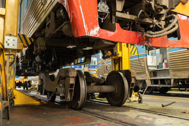 istock Close-Up of Train Wheels and Undercarriage in Workshop 2149680662