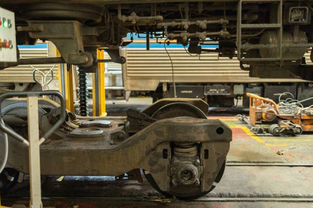 istock Close-Up of Train Wheels and Undercarriage in Workshop 2149680695