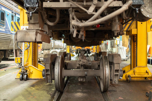istock Close-Up of Train Wheels and Undercarriage in Workshop 2149680705