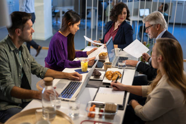 istock Coworkers In Office Cafeteria 2149681367