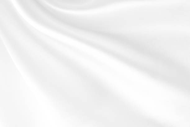 istock close up of white wavy blurry fabric texture background 2149682823