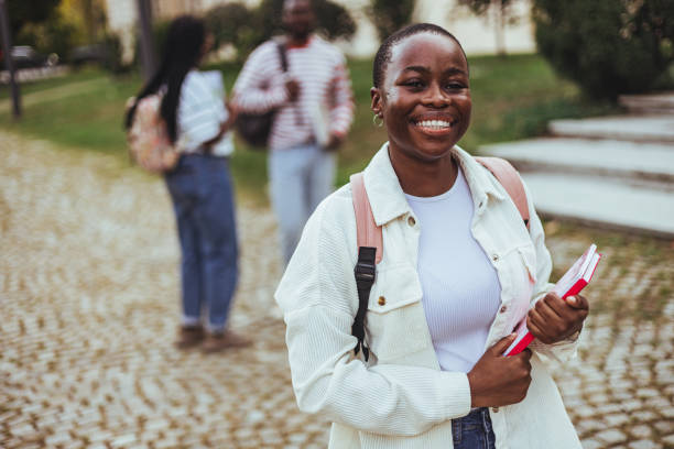 istock Young student with bag smiling in high school campus 2149683633