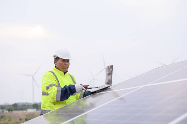 istock Business man or owner check job progress of solar panel installation , sustainable and renewable energy , business discussion 2149683779