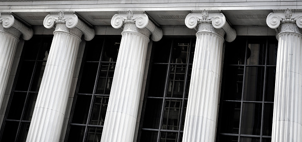 Detail of building bank courthouse with pillars and columns