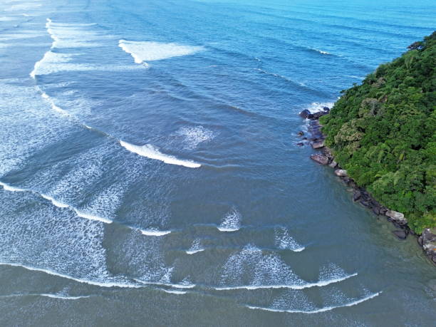 istock Blue water and waves surroundig an island 2149685339