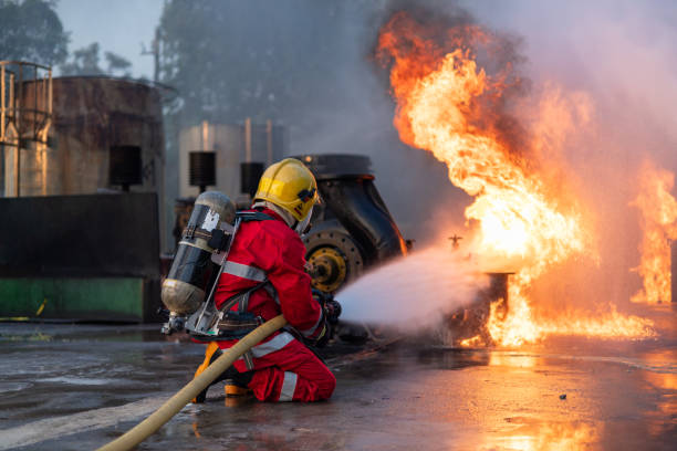 istock Firefighters Extinguishing Blaze in Industrial Area 2149685538