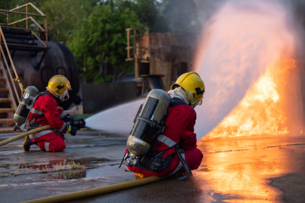 istock Firefighters Extinguishing Blaze in Industrial Area 2149685577