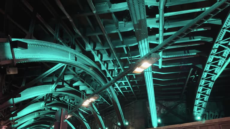 Detail of Trankgasse tunnel in Cologne with metal iron ceiling illuminated with lights