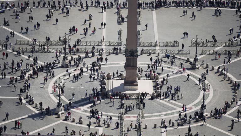 Aerial view of tourist people crowd at obelisk landmark at St Peter'square in Vatican City, Rome, Italy