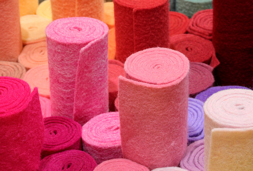 Colorful felt rolls for sale in a craft store for making handmade crafts