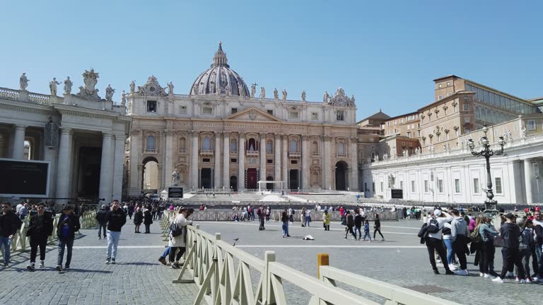 Crowd of tourist gathered on square near Saint Peters Cathedral