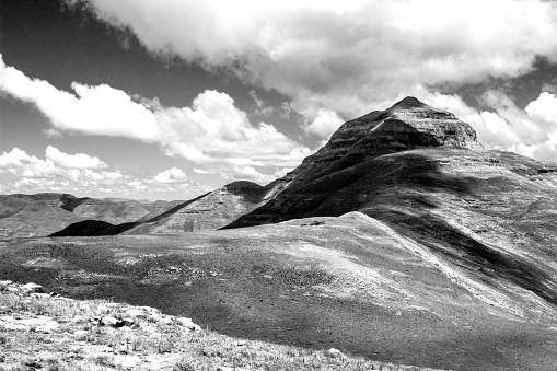 Dramatic Black and White view of Ribbok kop, one of the high peaks of the Drakensberg Mountains in South Africa,