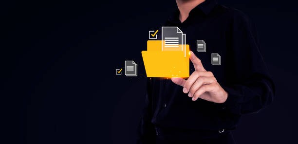 istock Businessman holding icons about business and document 2149689267