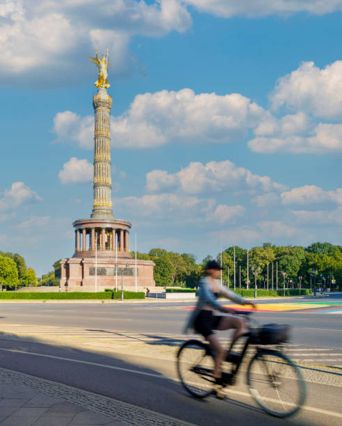 istock Bike commuter passing by Tiergarten park during sunset Berlin, Germany 2149689586