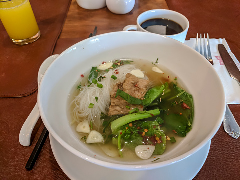 Breakfast of beef noodle soup, Siem Reap, Cambodia