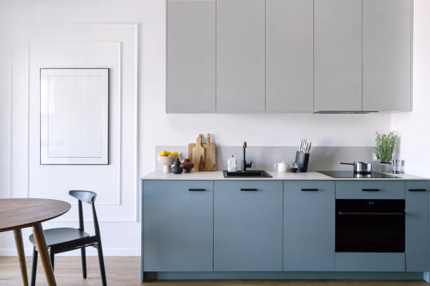 istock Kitchen with modern interior and household appliances, dining table and chair 2149690884