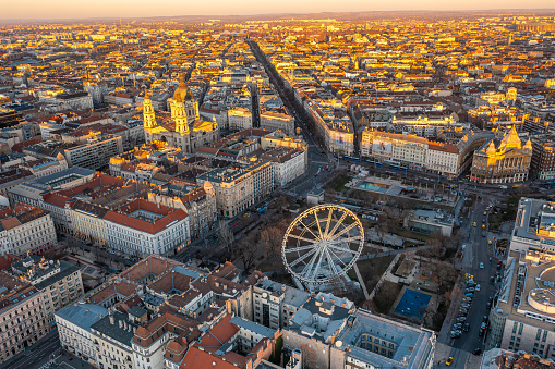 Budapest, Hungary. Drone view of Elizabeth Square, Ferris wheel, St. Stephen's Basilica Parliament