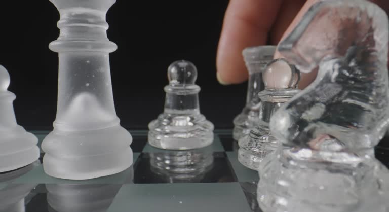 Macro shot of business people play with chess game. success management concept of business strategy and tactic challenge.