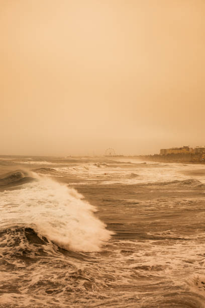 Beach in Malaga during sand and dust from Sahara in the atmosphere