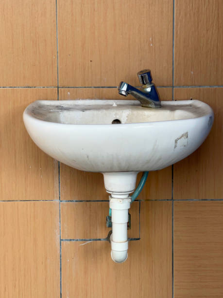 istock A modern white ceramic sink with a sleek faucet. 2149693101