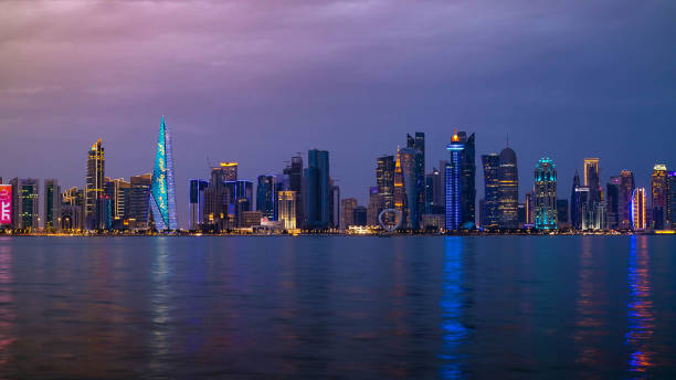 The illuminated, urban skyline of Doha, Qatar