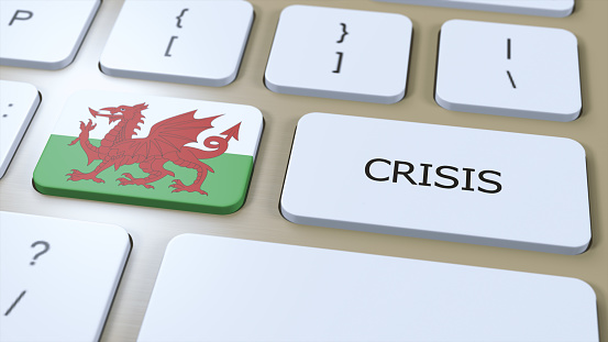 Wales Crisis in Country. National Flag and Button with Text 3D Illustration.