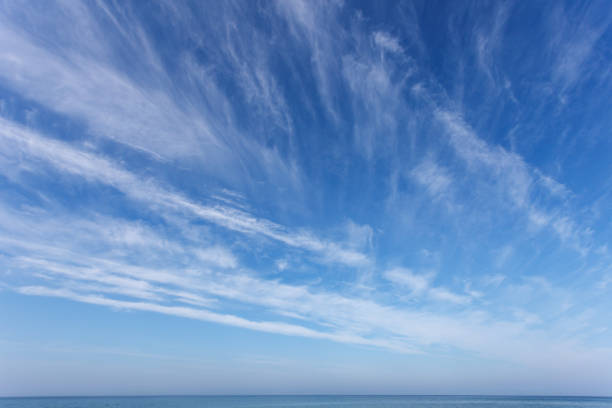 istock Beautiful blue sky over the sea with translucent, white, Cirrus clouds 2149701460
