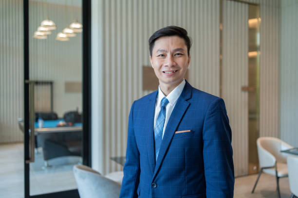 istock Confident Businessman with Tablet in Modern Office 2149701970